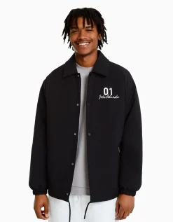 BERSHKA Blouson imprimé dos Noir Hot