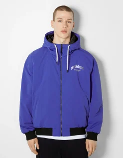 BERSHKA Blouson matelassé capuche imprimé Bleu Fashion