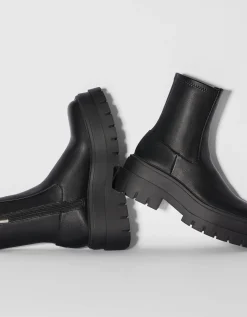 BERSHKA Bottines plateforme moulantes Noir Store