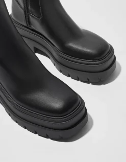 BERSHKA Bottines plateforme moulantes Noir Store