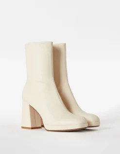 BERSHKA Bottines talon moulantes mini plateforme Écru Outlet