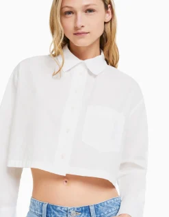 BERSHKA Chemise manches longues cropped popeline Blanc Outlet