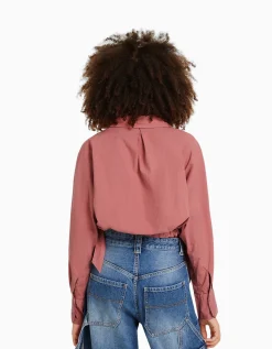 BERSHKA Chemise manches longues cropped avec lanières Rose Discount