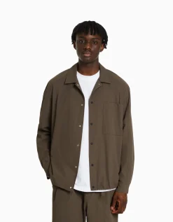 BERSHKA Chemise manches longues technique parachute Noir Store