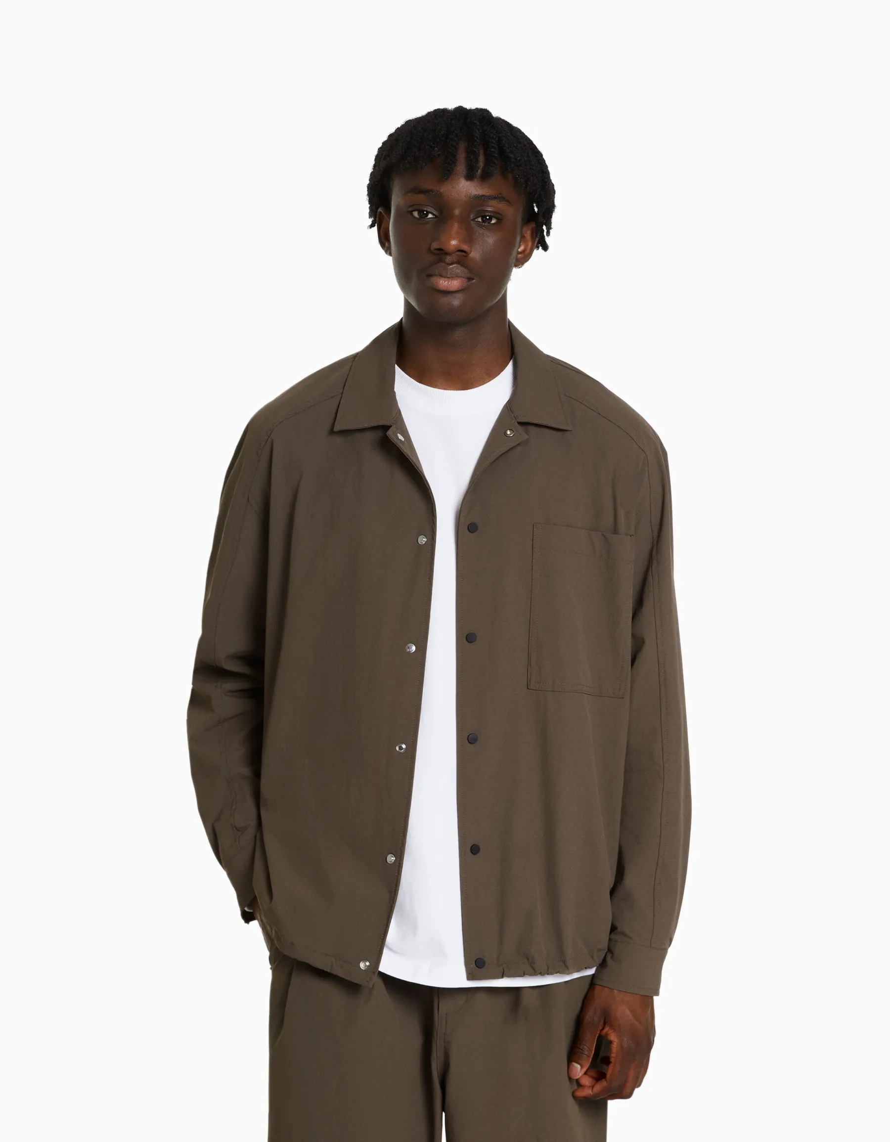 BERSHKA Chemise manches longues technique parachute Noir Store