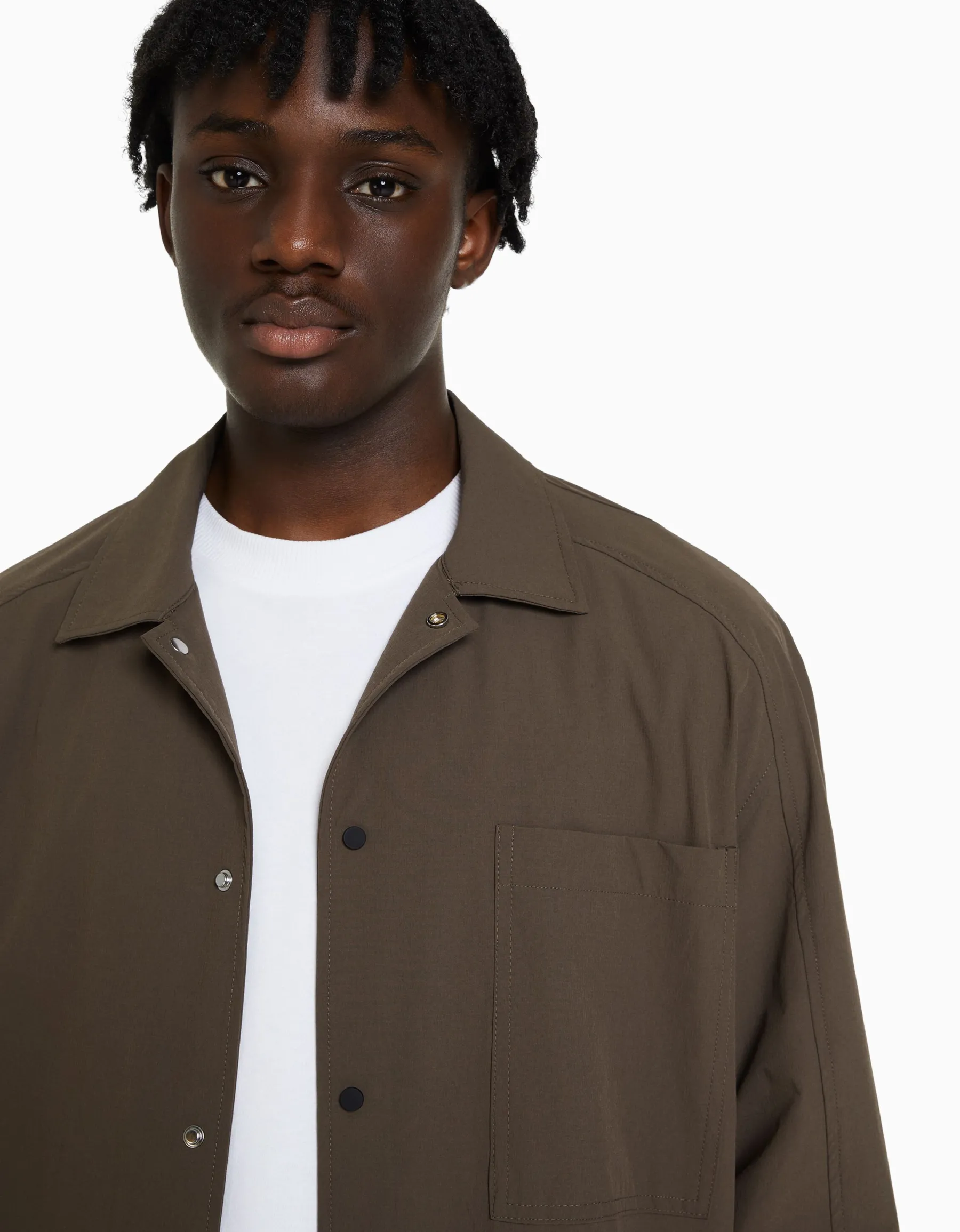 BERSHKA Chemise manches longues technique parachute Noir Store