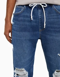 BERSHKA Jean jogger déchiré Bleu Best Sale