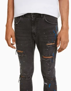 BERSHKA Jean skinny déchirures taches de peinture Bleu lavé Cheap
