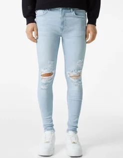BERSHKA Jeans super skinny déchirés Bleu lavé Store
