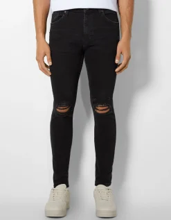 BERSHKA Jeans super skinny déchirés Bleu Shop