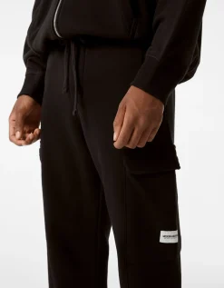 BERSHKA Pantalon jogger cargo molleton Noir Hot