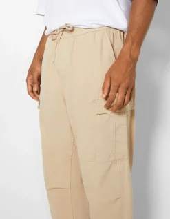 BERSHKA Pantalon jogger cargo regular fit Sable Online