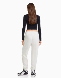 BERSHKA Pantalon jogger molleton imprimé Blanc Clearance