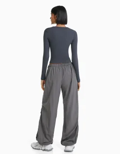 BERSHKA Pantalon jogger parachute nylon Noir Fashion