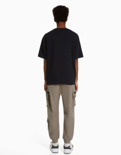 BERSHKA Pantalon jogger technique multifonction Camel Sale