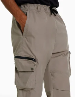 BERSHKA Pantalon jogger technique multifonction Camel Sale