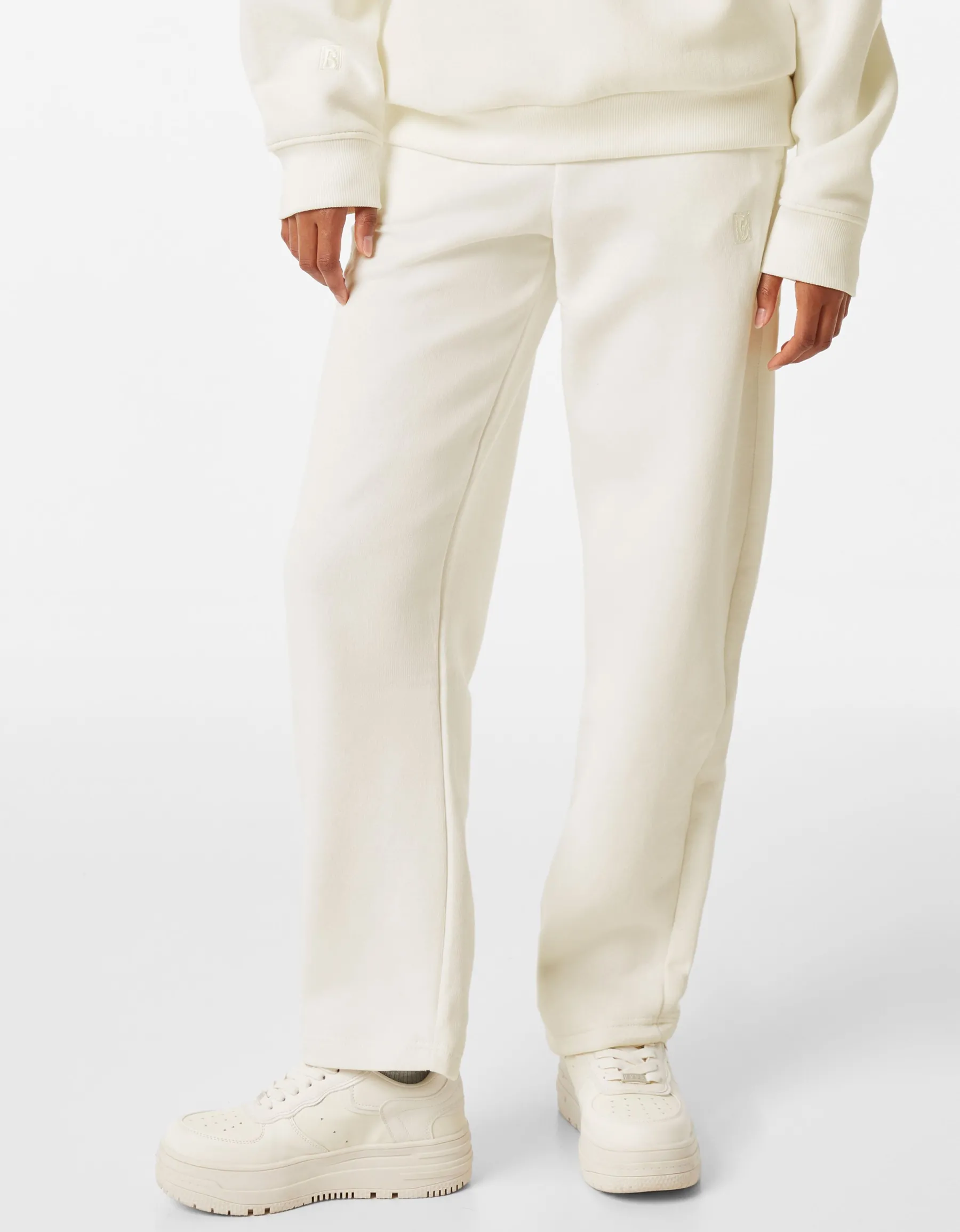 BERSHKA Pantalon molleton wide leg Blanc cassé Fashion