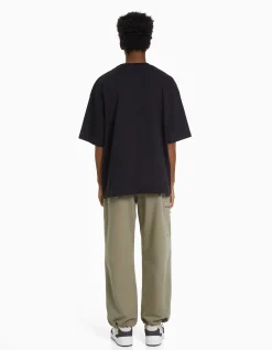 BERSHKA Pantalon parachute molleton poche fermeture Éclair Kaki Discount