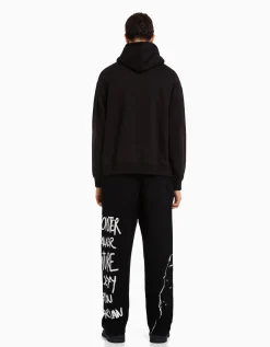 BERSHKA Pantalon wide leg molleton taille élastique imprimé Noir Cheap