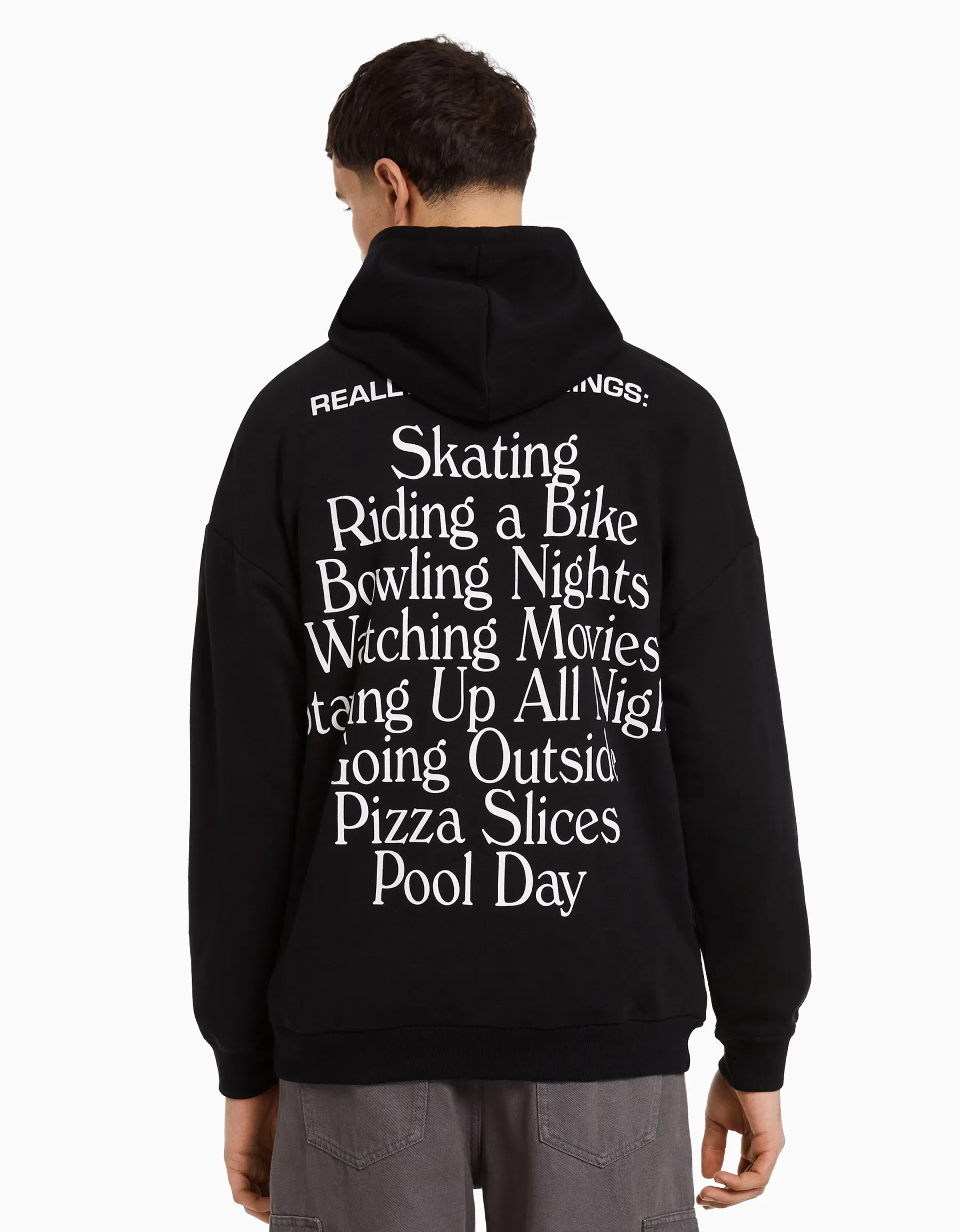 BERSHKA Sweat capuche easy fit imprimé Noir Hot