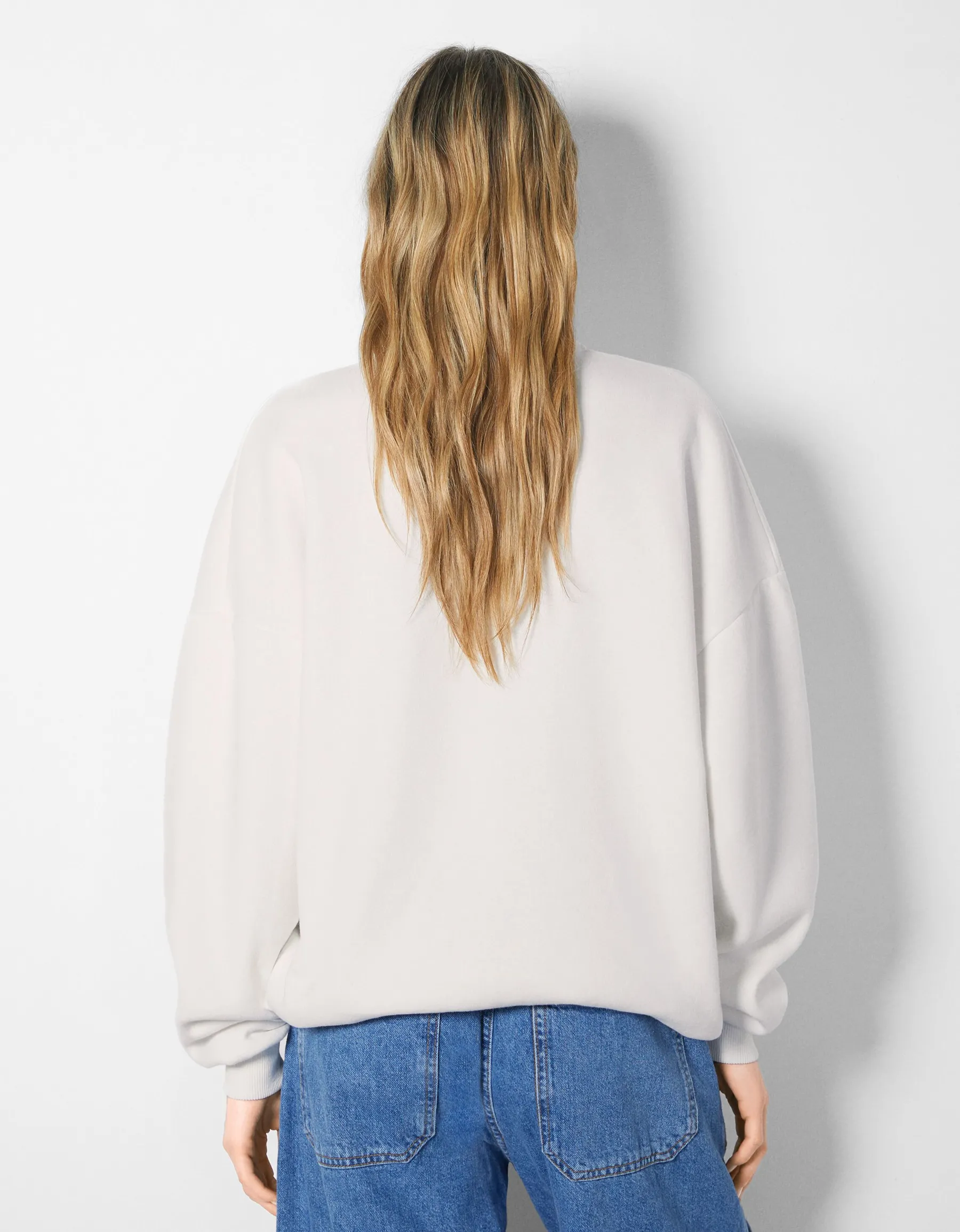 BERSHKA Sweat col montant zippé imprimé Bleu foncé Store