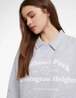 BERSHKA Sweat col polo imprimé Marine Sale