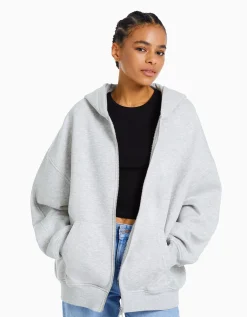 BERSHKA Sweat zippé capuche oversize Gris Hot