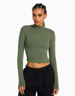 BERSHKA Top col montant manches longues Blanc cassé Store