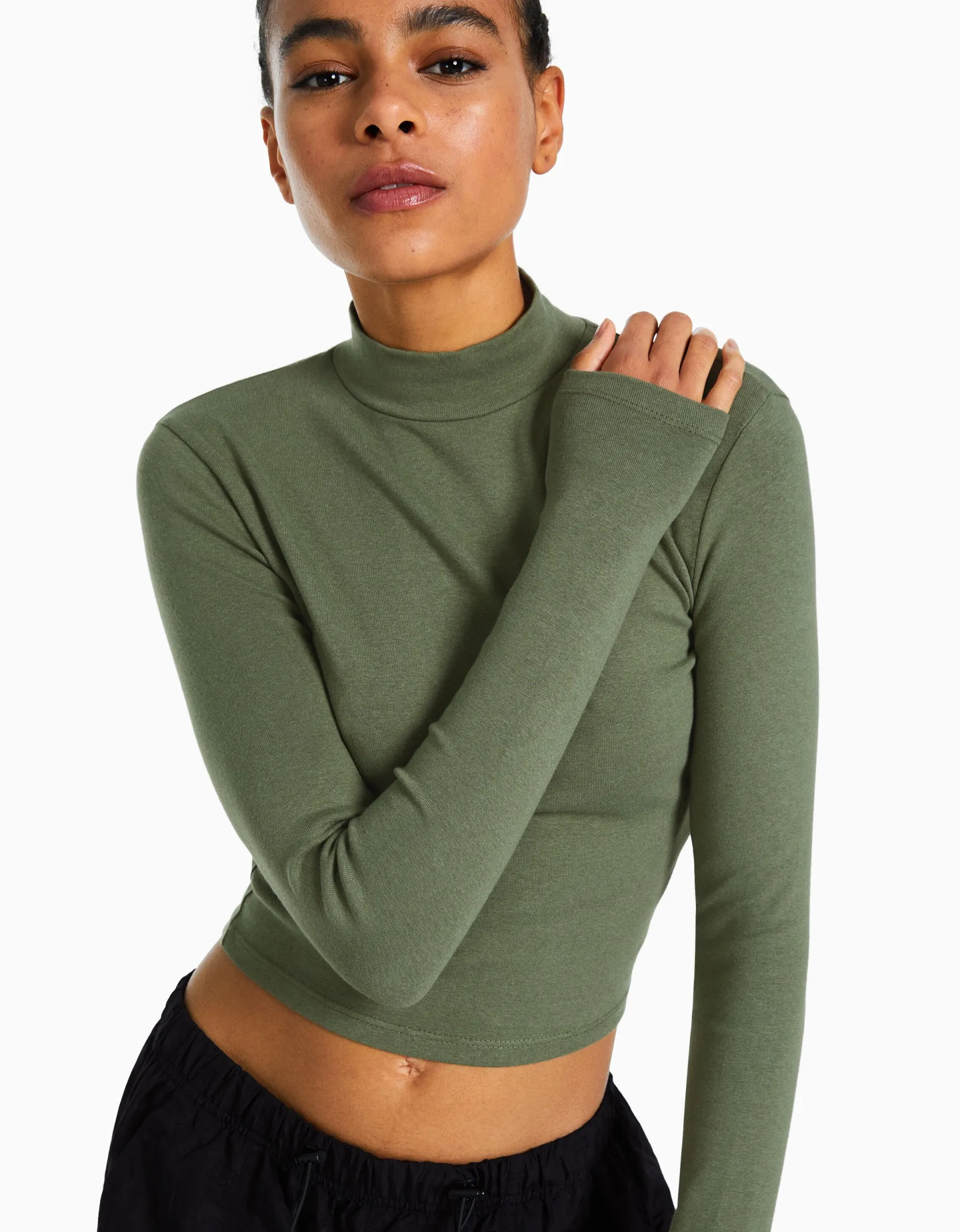 BERSHKA Top col montant manches longues Blanc cassé Store