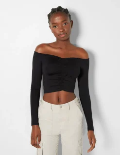 BERSHKA Top cropped manches longues col style Bardot fronces Noir Store