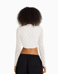 BERSHKA Top manches longues en dentelle décolleté croisé Écru Sale