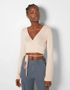 BERSHKA Top manches longues nœud décolleté croisé Rose Best Sale
