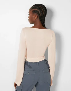 BERSHKA Top manches longues nœud décolleté croisé Rose Best Sale