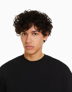 BERSHKA Top manches longues oversize imprimé Noir Outlet